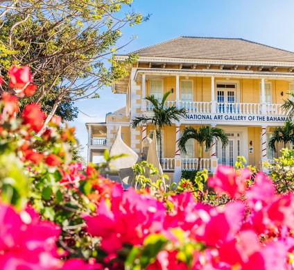 a building with flowers in front of it