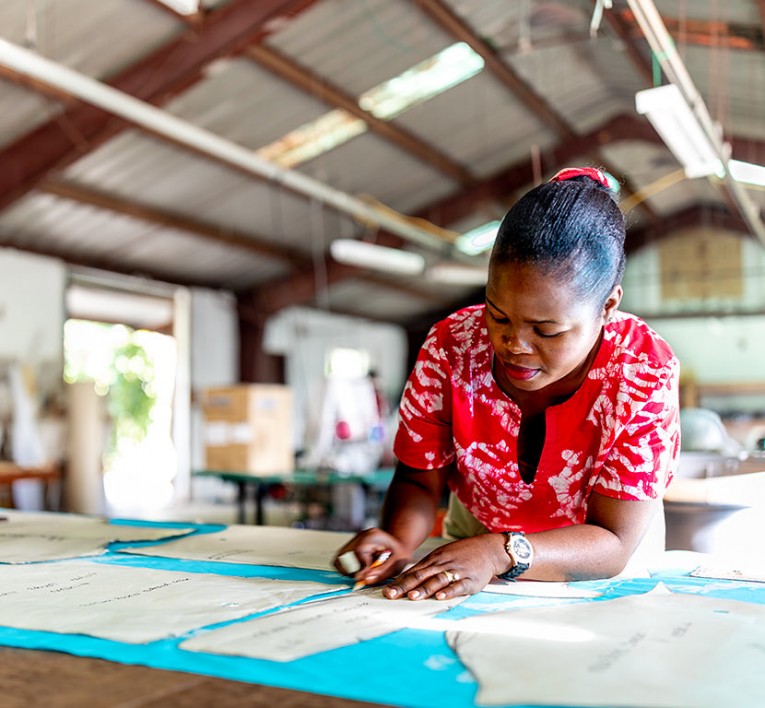 Lady creating an Androsia batik