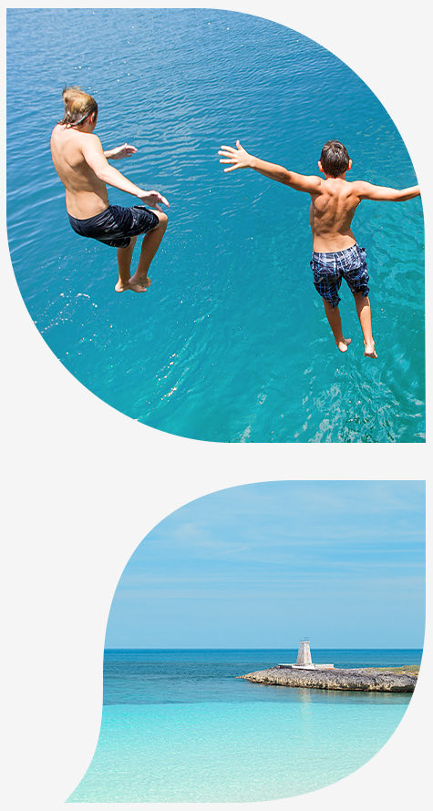 top image two boys jumping in blue ocean water bottom image beach with Island 