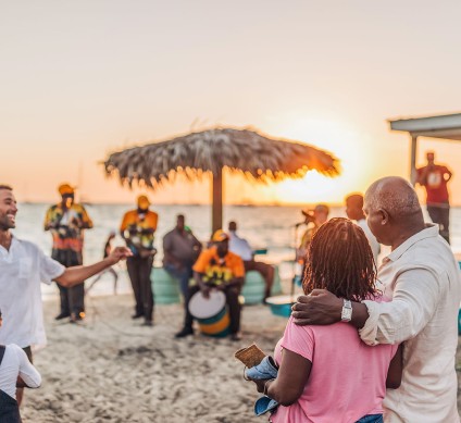 a group of people at a beach