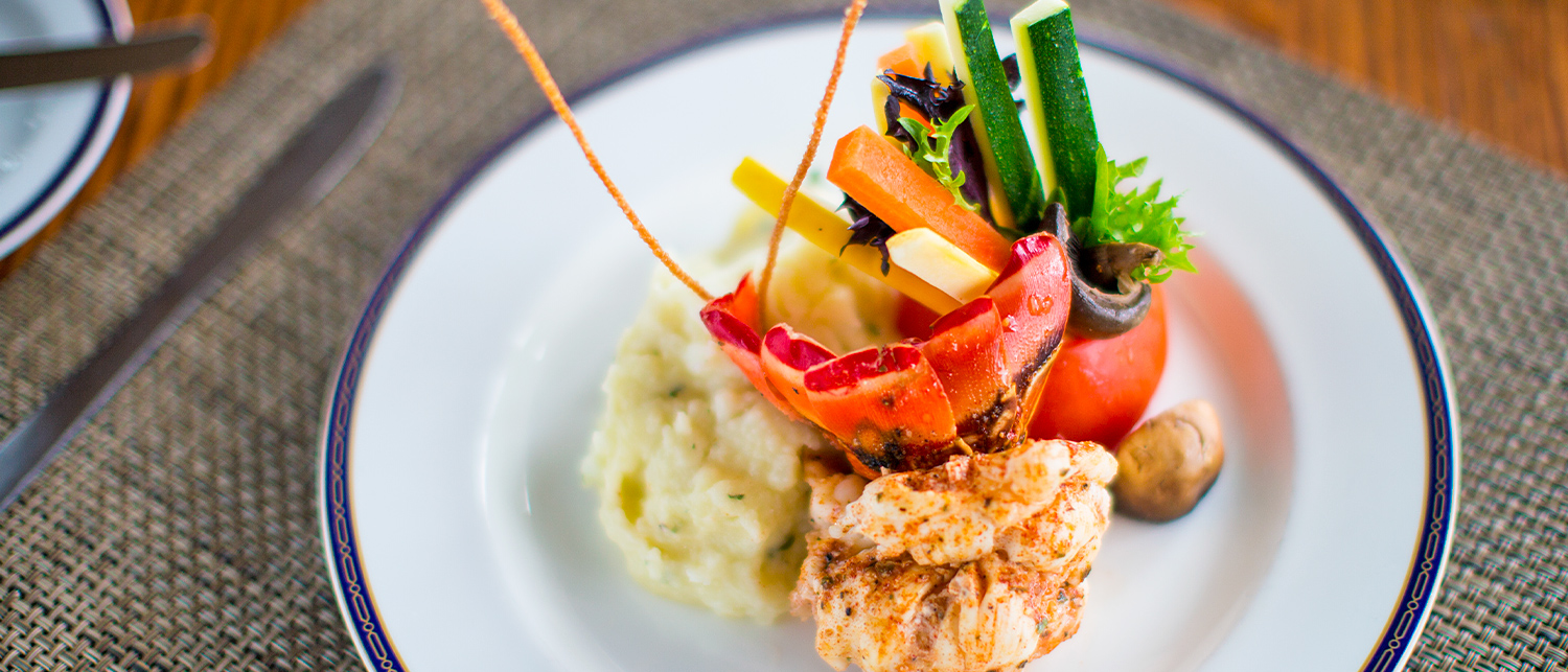 plate with seafood, veggies, and mashed potatoes