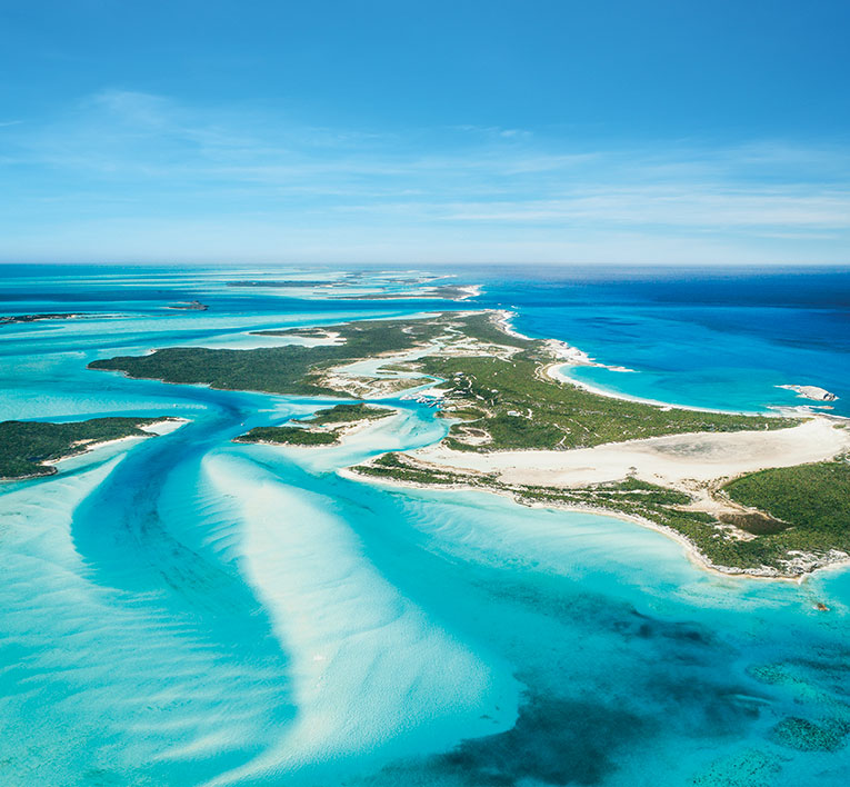 a beach with blue water